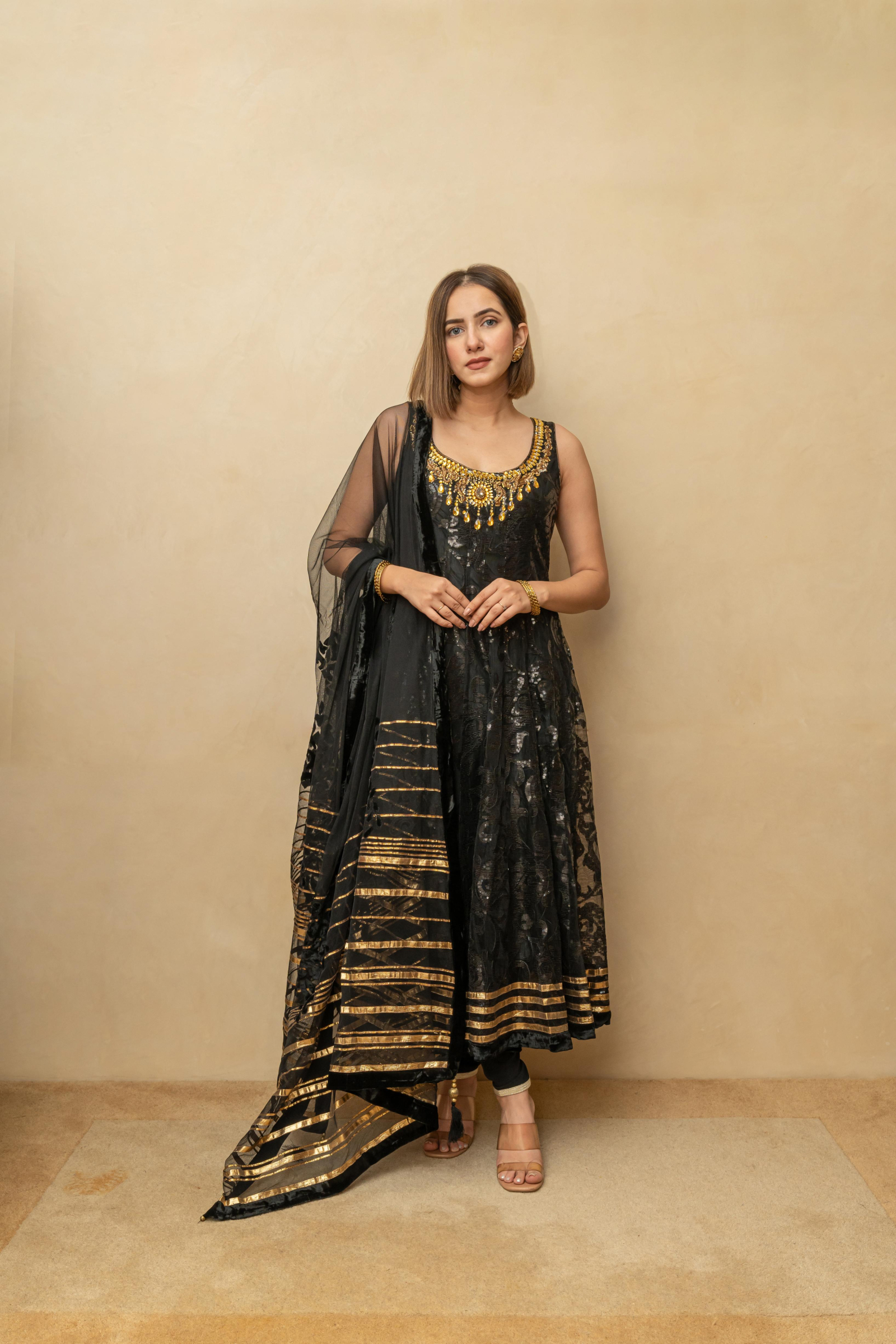 Black and gold self sequence work anarkali suit set